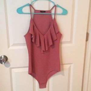 Pink ruffled body suit